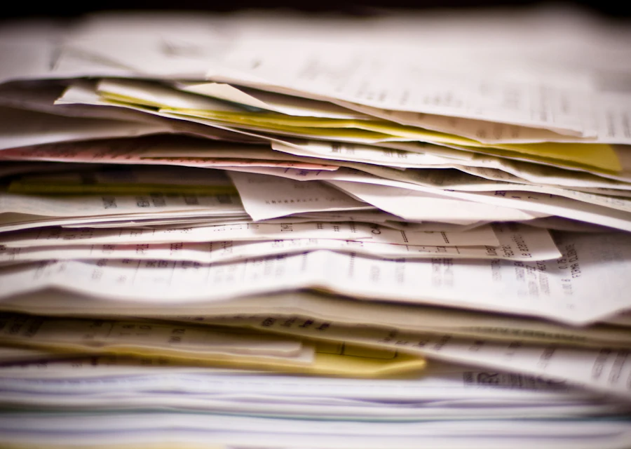 An auditor reviewing account books and a checklist