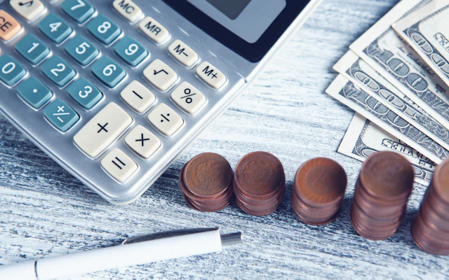 A ledger and calculator for a fixed asset register