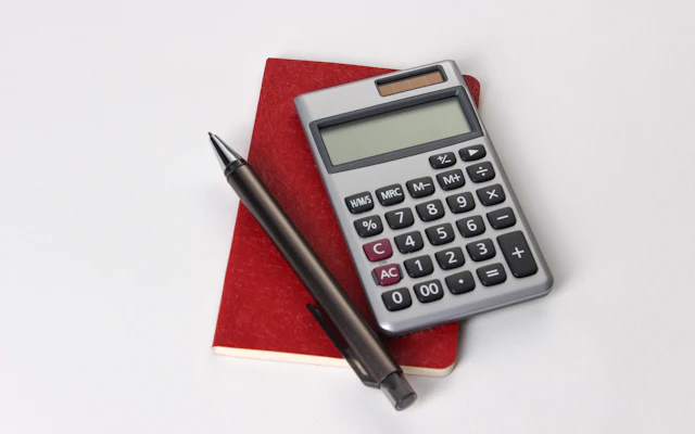 Rupee notes and a calculator for TDS working